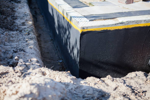 Professional Emergency Waterproofing technician working in Louisville, GA